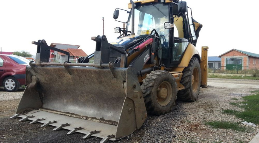 Buldoexcavator CAT 428 E (a)