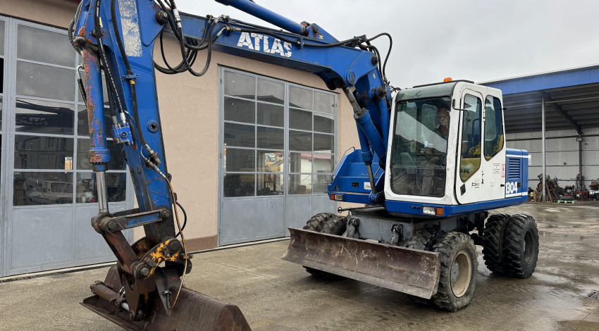 Excavator cu roti Atlas 1304